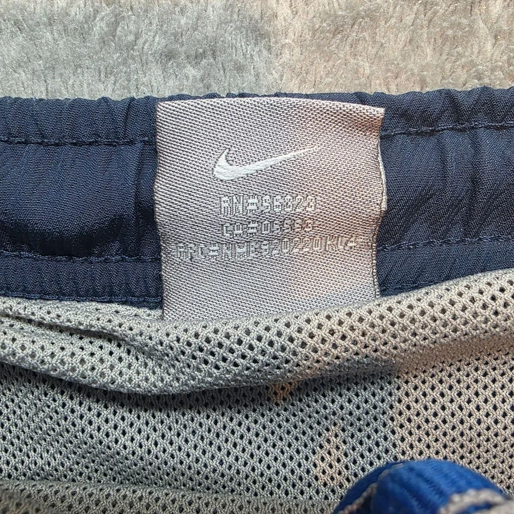 Nike Swim Shorts Mens M Blue Geometric Print Mesh Liner Zip Pocket Elastic Waist